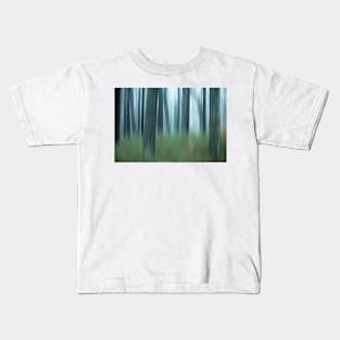 Blurred abstract trees in forest on foggy morning Kids T-Shirt